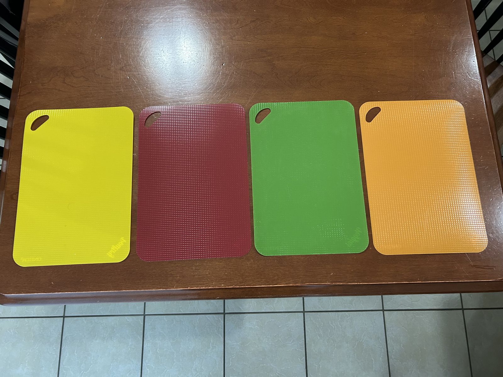 Set of 4 plastic color-coded cutting boards