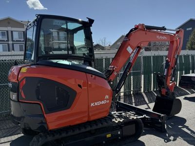 Kubota KX040-5 Mini Excavator Rental – 4 Ton Excavator w/ Thumb and angle blade