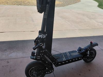 Dual motor scooter for sale one year old 150$