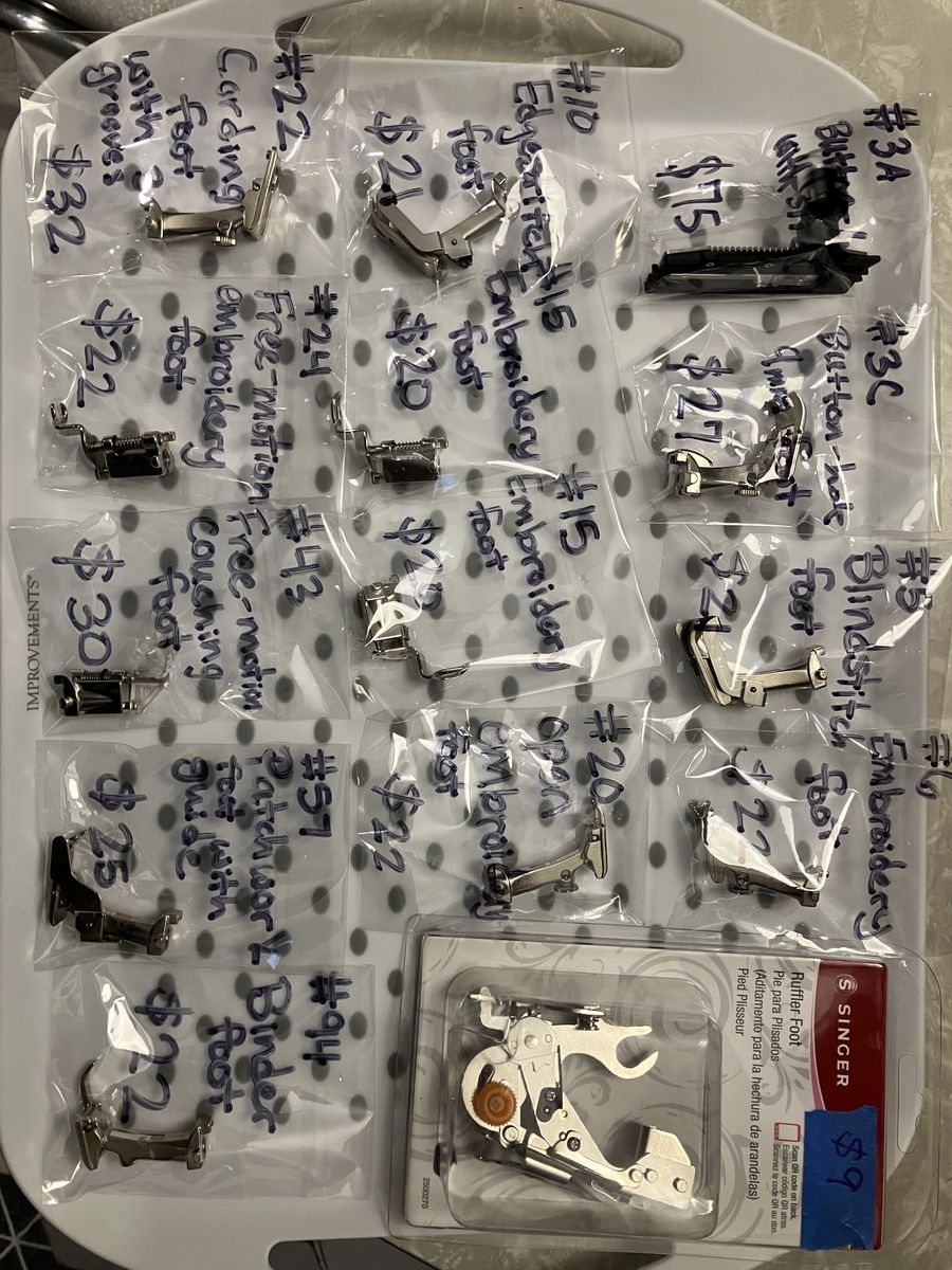Assorted Bernina and Singer sewing machine presser feet. Price as marked, starting at $20.