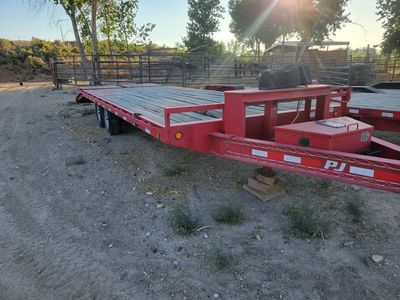 PJ Trailers 14000 LB GVWR 24ft Deckover Utility Trailer with Winch