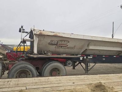 359 Peterbilt and 3 axle sid super tri side dump