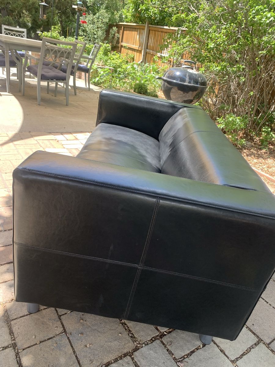 IKEA brown leather small sofa