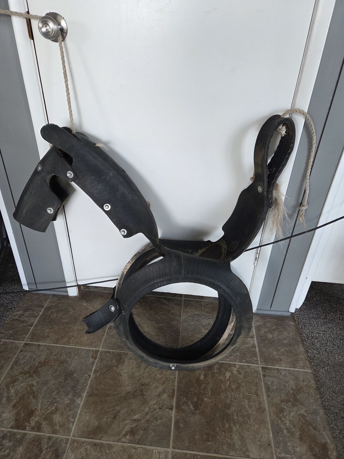 horse tire swing made from a recycled tire