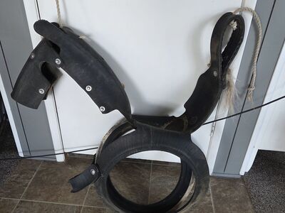 horse tire swing made from a recycled tire