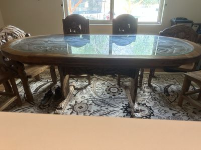 Hand-Carved Wooden Dining Table Set with Glass Top and Matching Chairs