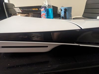 Sony PlayStation 5 Disc Console with 7 PS4 Games & 2 Controllers