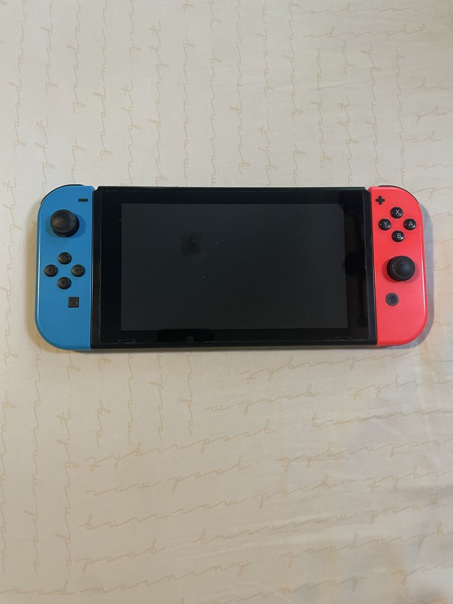 Nintendo Switch Console with Neon Blue and Neon Red Joy-Con