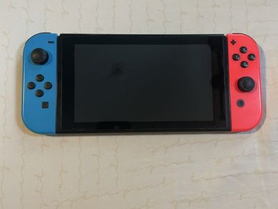 Nintendo Switch Console with Neon Blue and Neon Red Joy-Con