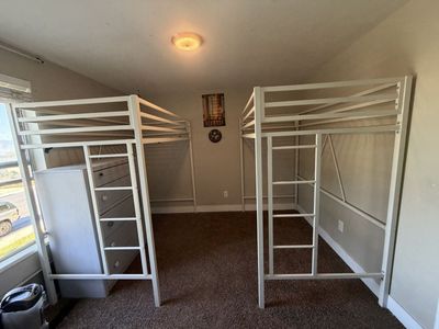 Two twin loft beds