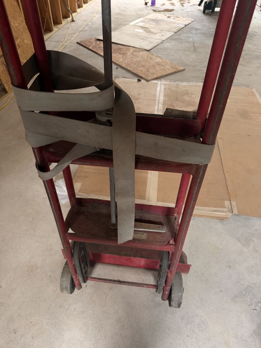 Red Heavy-Duty Hand Truck Dolly with Built-In Ratchet Strap