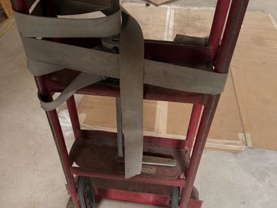 Red Heavy-Duty Hand Truck Dolly with Built-In Ratchet Strap
