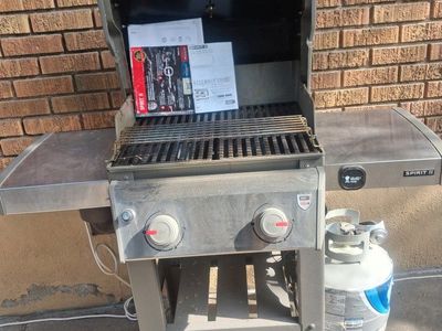Weber Spirit II 2-Burner Propane Gas Grill with Cover and Tank