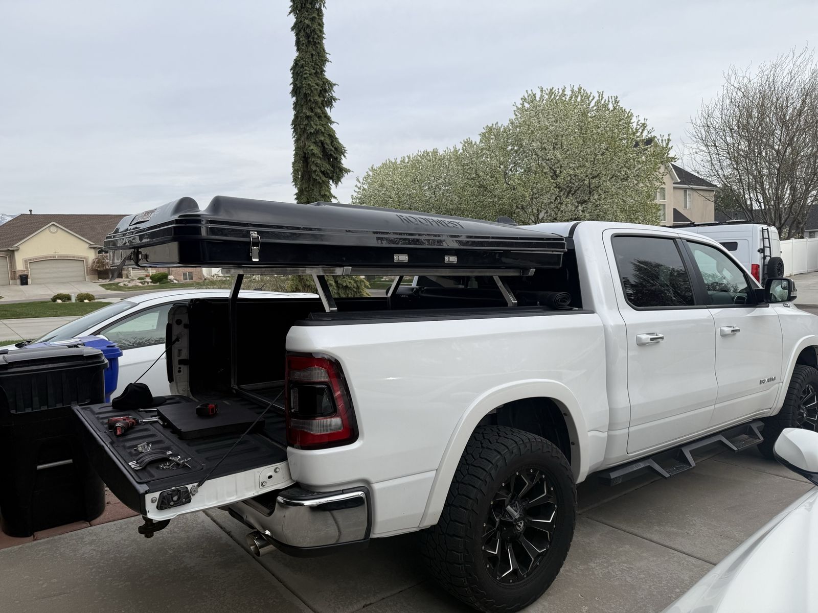 Rooftop tent and truck bed rack.