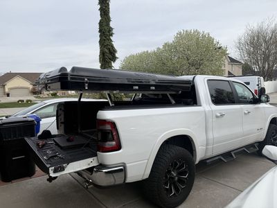 Rooftop tent and truck bed rack.