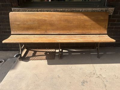6ft wooden bench with decorative iron legs