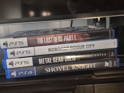 PS5/PS4 Game Lot: The Last of Us Part I, Robocop, Metal Gear Solid, Shovel Knight - Great Condition!