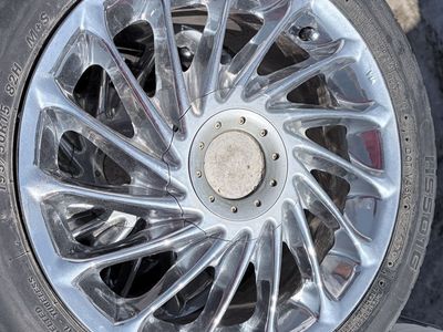 Chrome Multi-Spoke Wheel with Ohtsu FP501 195/50R15 82H Tire