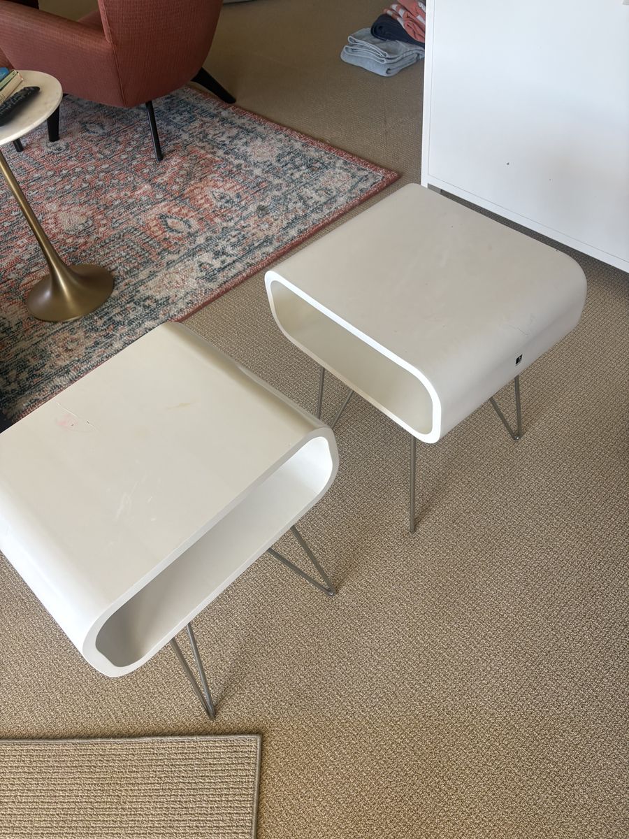 Two white bedside tables