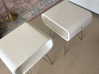 Two white bedside tables