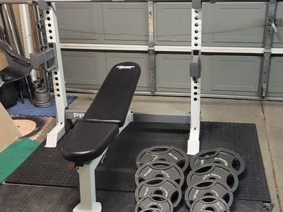 Bench and 255 pounds of weights