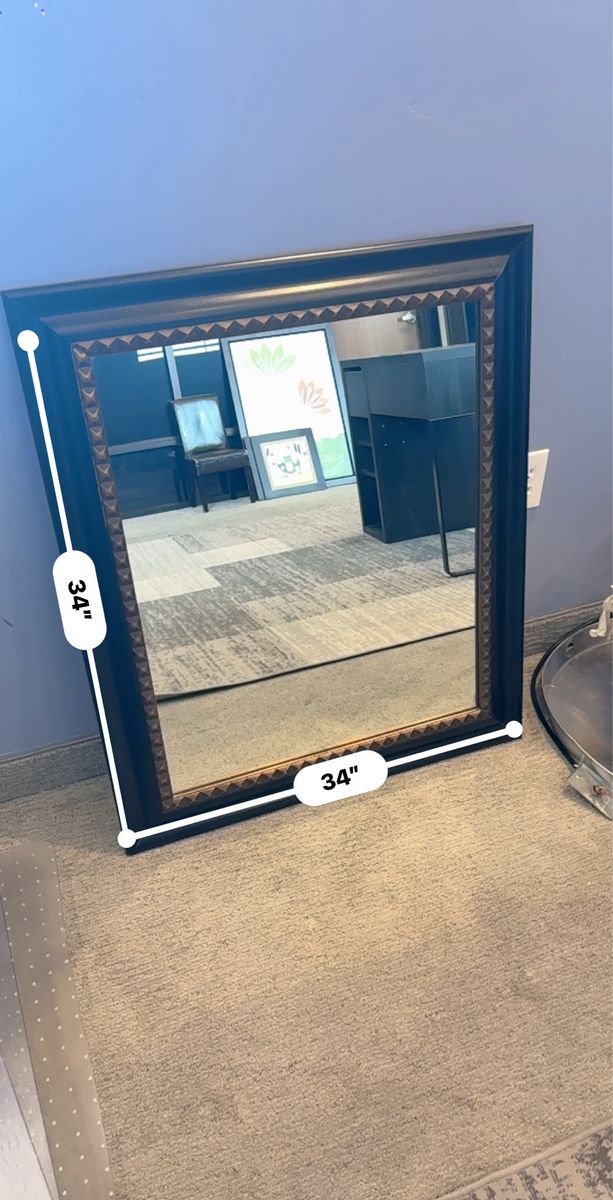 Brown with gold trim mirror