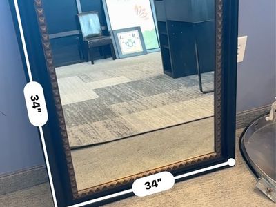 Brown with gold trim mirror