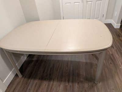Extendable wood table and chairs