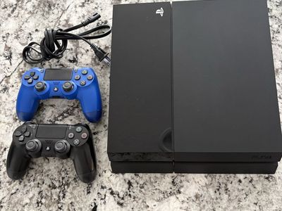 Sony PlayStation 4 (PS4) 500GB Console with 2 Controllers - Black & Blue DualShock
