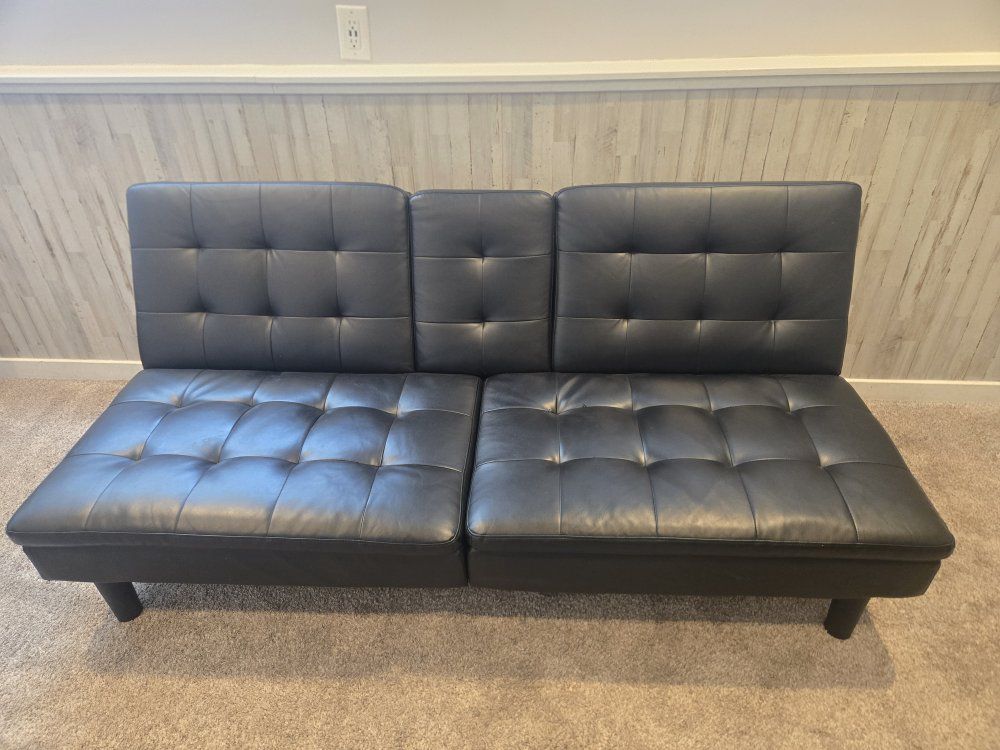 Convertible Black Faux Leather Futon Sofa Bed w/ Cupholders - Tufted Design