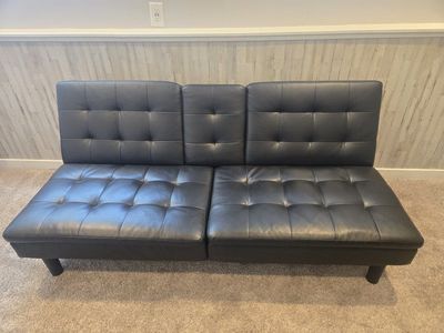 Convertible Black Faux Leather Futon Sofa Bed w/ Cupholders - Tufted Design