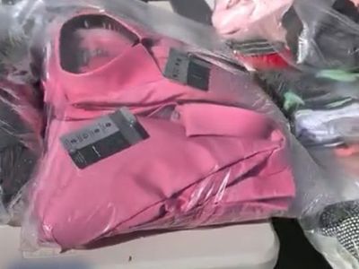 Hundreds of Women's & Mens name brand clothing.