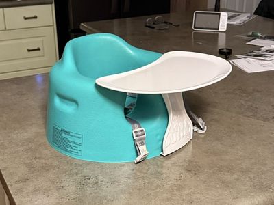 Bumbo baby seat with tray.