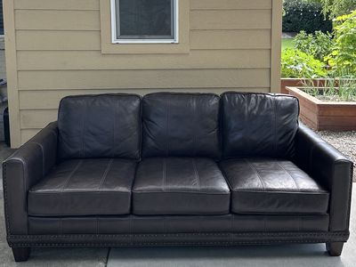 Dark brown leather couch, will deliver for free