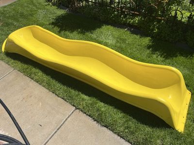 Long yellow playground swingset wave slide 10’