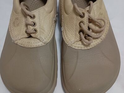 Women's size 6 crocs with leather upper. Size 4 boys