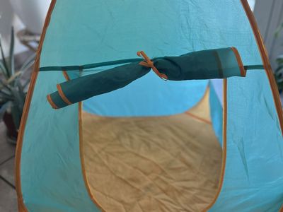 Kids pretend camping setup with tent, lantern, cantine, pretend fire, etc