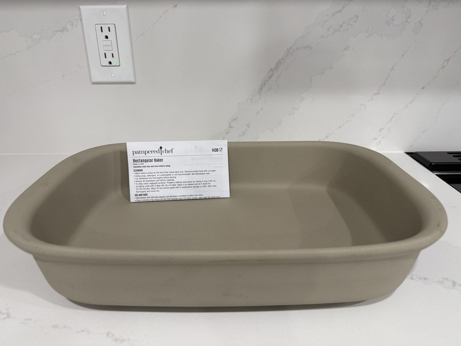 Pampered Chef Rectangular Baker Stone Bakeware, pizza stone and round baking stone.