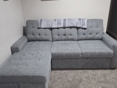 Couch- Fold Out into Sleeper