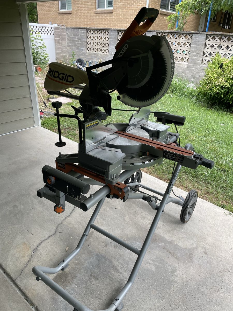 12” rigid dual bevel compound miter saw with stand, great condition!