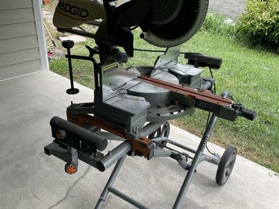 12” rigid dual bevel compound miter saw with stand, great condition!