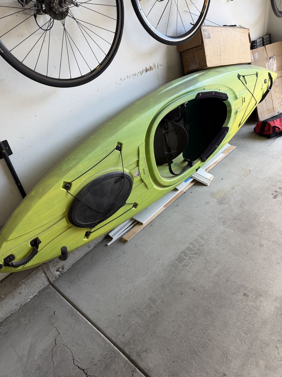 Emotion Kayaks Green Sit-In Kayak with Storage Hatch