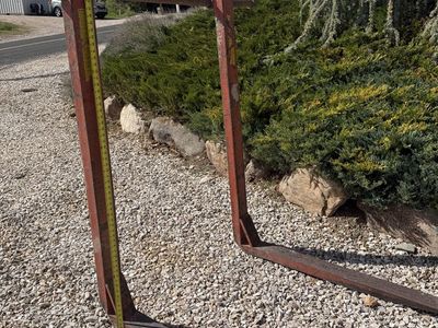 Over-the-bucket backhoe loader pallet forks