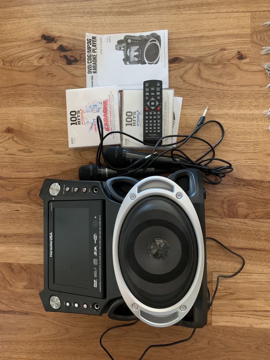 Karaoke USA GF829 DVD/CDG/MP3G Karaoke Player w/ 2 Microphones & 100 Hits CDs