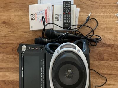 Karaoke USA GF829 DVD/CDG/MP3G Karaoke Player w/ 2 Microphones & 100 Hits CDs