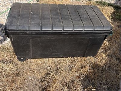 Large Black Heavy-Duty Plastic Storage Footlocker Trunk with Wheels