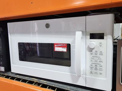 BEAUTIFUL WHITE GE OVER THE RANGE MICROWAVE! W-WARRANTY