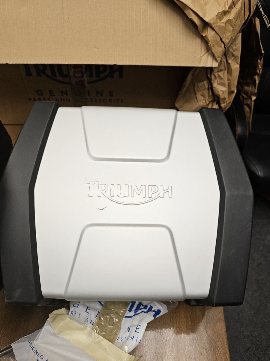 Two Triumph Tiger pannier bags, with hardware