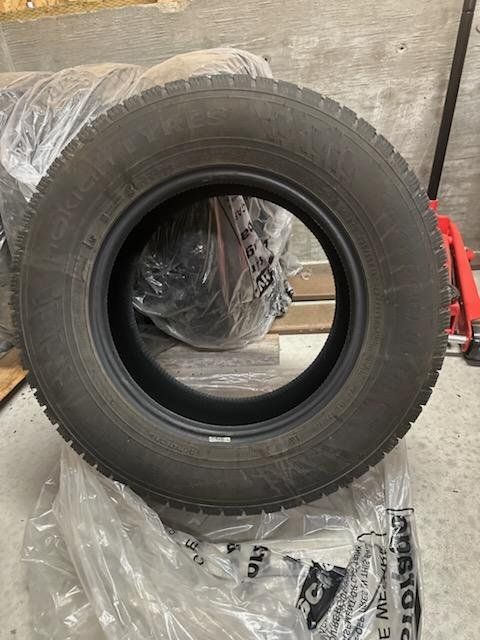 235/65r16 studded snow tires like new OBO