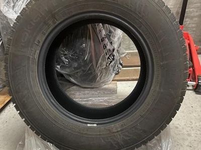 235/65r16 studded snow tires like new OBO